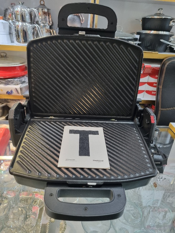 داخل و دفترچه ساندویچ ساز و توستر کاراجا ترکیه مدل 1337h رنگ سیاه